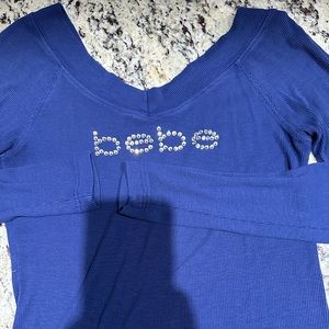 Bebe women’s top size medium. Great condition!